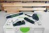 A collection of Festool tools, including a measuring tape, utility knife, and a folding ruler, are arranged on top of a white Festool storage case. Anteprima dell’immagine prodotto