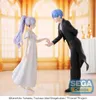 Two anime figurines, a woman in a white dress and a man in a tuxedo, dancing in a ballroom. Anteprima dell’immagine prodotto