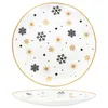 A white plate with a snowflake and star pattern, shown from a top-down and side view. Náhled obrázku produktu