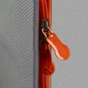 A close-up shot of an orange zipper pull on a gray mesh bag. Voir les images du produit