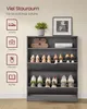 A shoe cabinet with shoes, books, and a plant, with icons indicating storage options. Produktbild-Vorschau
