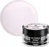A pink gel product in a clear jar with a black lid, next to a large, translucent pink sphere. The product is a nail gel. Náhled obrázku produktu