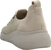 A side view of a beige sneaker. Produktbild-Vorschau
