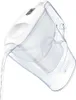 A white Brita water filter pitcher is tilted, pouring filtered water out of its spout. The pitcher is clear, allowing the water inside to be seen. Náhled obrázku produktu