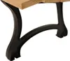 A close-up view of the cast iron legs and wooden seat of a bench. Produktbild-Vorschau