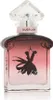 A perfume bottle with a pink gradient and a black silhouette of a dress. Voir les images du produit