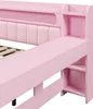 Close-up view of a pink bed frame with integrated shelving. Náhľad obrázku produktu