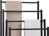 A black metal towel rack with two towels hanging on it. Produktbild-Vorschau