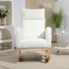 A white rocking chair with wooden legs is shown in a well-lit room with decorative elements. Anteprima dell’immagine prodotto