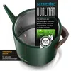 A close-up view of a green electric kettle with a cutaway showing the interior, featuring marketing text and graphics. Podgląd zdjęcia produktu