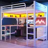 A loft bed with an integrated desk and shelving, set up in a modern room with gaming-themed decor and LED lighting. Anteprima dell’immagine prodotto