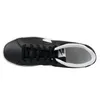 A top-down view of a black Nike sneaker with white accents. Náhled obrázku produktu