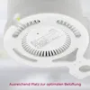 Close-up view of the bottom of a white TP-Link Deco mesh Wi-Fi router, showing ventilation slots and a label with product information. Produktbild-Vorschau