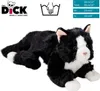 A black and white plush cat toy lying down, with brand logo and size information in the background. Náhľad obrázku produktu