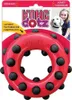 A KONG Dotz Circle dog toy is displayed on its retail packaging, with a young girl and a dog visible in the background. Produktbild-Vorschau