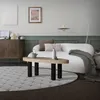 A living room scene with a sofa, coffee table, and cabinet. Podgląd zdjęcia produktu