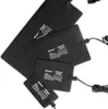Several black heating mats of different sizes are arranged on a white background. Anteprima dell’immagine prodotto
