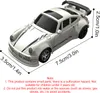 A white remote control drift car with black racing stripes and a spoiler, shown from a three-quarter angle. Náhled obrázku produktu