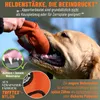 A dog is biting an orange dog toy. There are close-up insets showing the dog's teeth and the toy's texture, along with marketing text. Produktbild-Vorschau