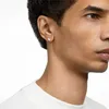 Close-up shot of a man wearing a single silver stud earring. Anteprima dell’immagine prodotto