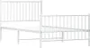 A white metal bed frame with a headboard and footboard, shown from a side angle against a white background. Náhled obrázku produktu