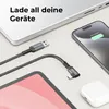 A charging cable is shown connecting a laptop, smartphone, and tablet, implying versatility. Produktbild-Vorschau