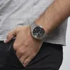 A person's arm wearing a watch, with their hand in their pocket. Náhľad obrázku produktu
