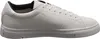 A side view of a white leather sneaker. Voir les images du produit