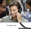 A man is talking on a smartphone while people are blurred in the background. Produktbild-Vorschau
