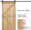 A wooden sliding door with a black metal track and hardware, accompanied by text indicating product specifications. Podgląd zdjęcia produktu
