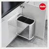 A built-in trash can with two compartments inside a kitchen cabinet. Produktbild-Vorschau