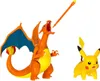 Two Pokemon action figures, Charizard and Pikachu, are shown against a white background. Charizard is in the foreground, appearing to breathe fire, while Pikachu is in the midground to the right. Podgląd zdjęcia produktu
