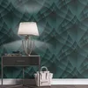 A close-up shot of a bedside table with a lamp and a handbag, against a patterned wallpaper. Produktbild-Vorschau