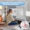 A mother sits by a crib with a bed rail installed, looking at her baby inside. A close-up of a baby's feet is also shown. Voir les images du produit