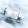 A bottle of Skin1004 Madagascar Centella Hyalu-Cica First Ampoule lying on its side in water. Voir les images du produit