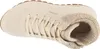 A close-up, top-down view of a beige Skechers sneaker with a textured collar. Voir les images du produit