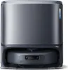 A front view of a gray robot vacuum cleaner with its charging dock. Anteprima dell’immagine prodotto