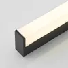 A close-up, angled view of a black LED light fixture with a white light diffusing cover. Produktbild-Vorschau