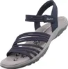 Auf dem Bild ist eine blaue Sandale abgebildet die von der Seite fotografiert wurde. Die Sandale zeigt ein schlichtes Design mit mehreren Riemen und einer komfortablen Sohle. Produktbild-Vorschau