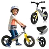 A young boy wearing a helmet is riding a balance bike, with additional close-up shots of the bike's components. Produktbild-Vorschau