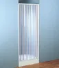 A shower door is installed against a light blue wall, with a wooden floor visible at the bottom. Náhled obrázku produktu
