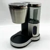 A studio shot of a coffee maker. Voir les images du produit