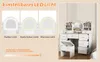 A vanity table with a mirror and stool, with a demonstration of LED light settings. Podgląd zdjęcia produktu