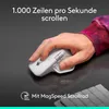 A hand using a white Logitech MX Master mouse on a dark reflective surface, with a keyboard visible in the lower right corner. Text overlays highlight product features. Produktbild-Vorschau