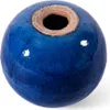 A close-up shot of a blue ceramic garden ball with an opening at the top. Produktbild-Vorschau
