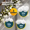 Christmas ornaments arranged on a staircase garland with lights. Anteprima dell’immagine prodotto