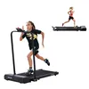 A child is running on a treadmill in the foreground, and a woman is running on a smaller treadmill in the background. Produktbild-Vorschau