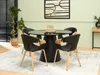 A dining room scene with a round black table and four black chairs with wooden accents, set on a patterned rug. Voir les images du produit