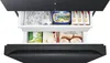 Close-up view of the open drawers of a refrigerator, showing various food items. Produktbild-Vorschau