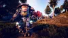 A large, colorful robot walks through a grassy, wooded area with trees and rocks. Produktbild-Vorschau